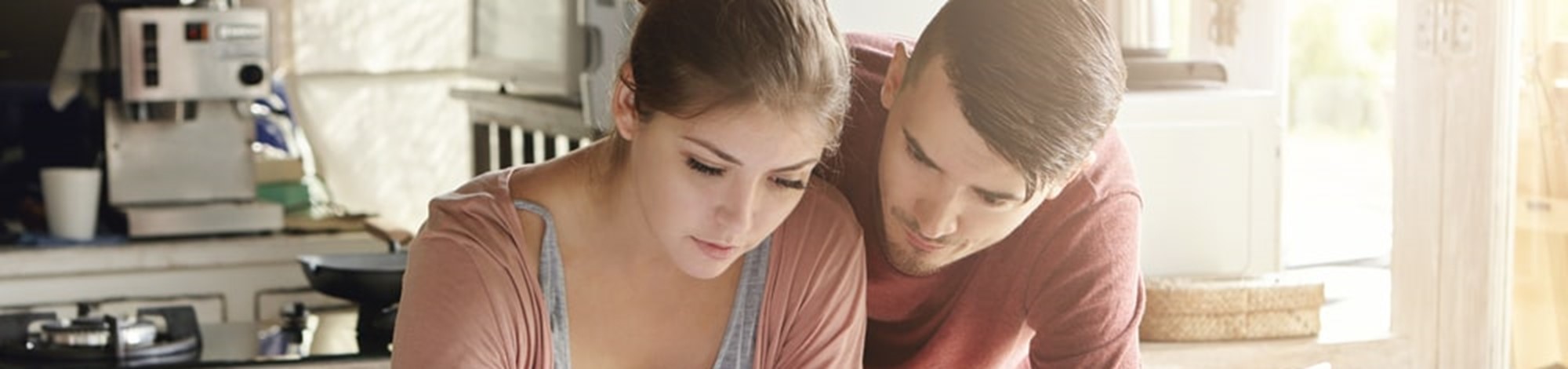 Couple looking at a bill