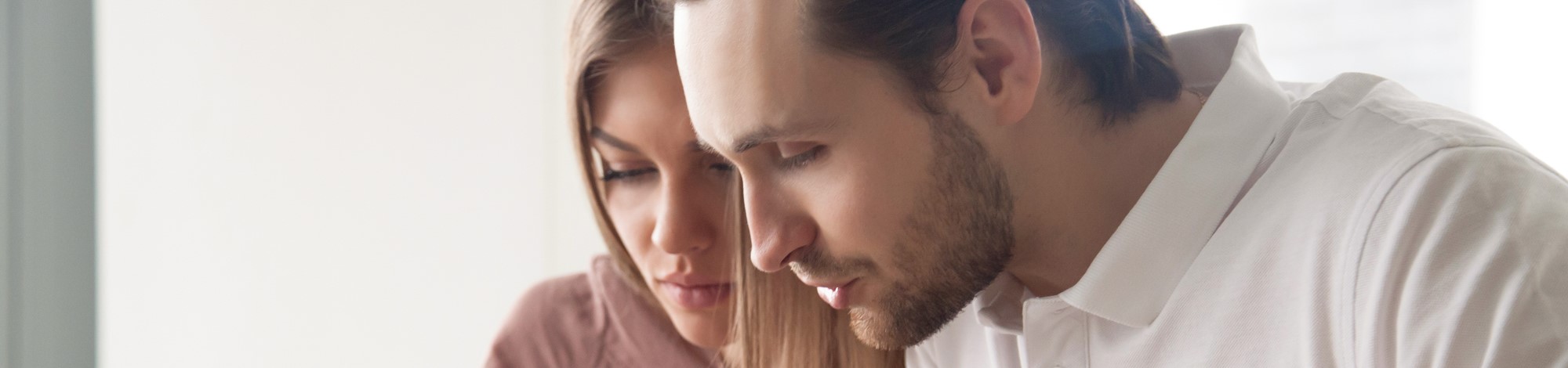 Couple looking at a bill