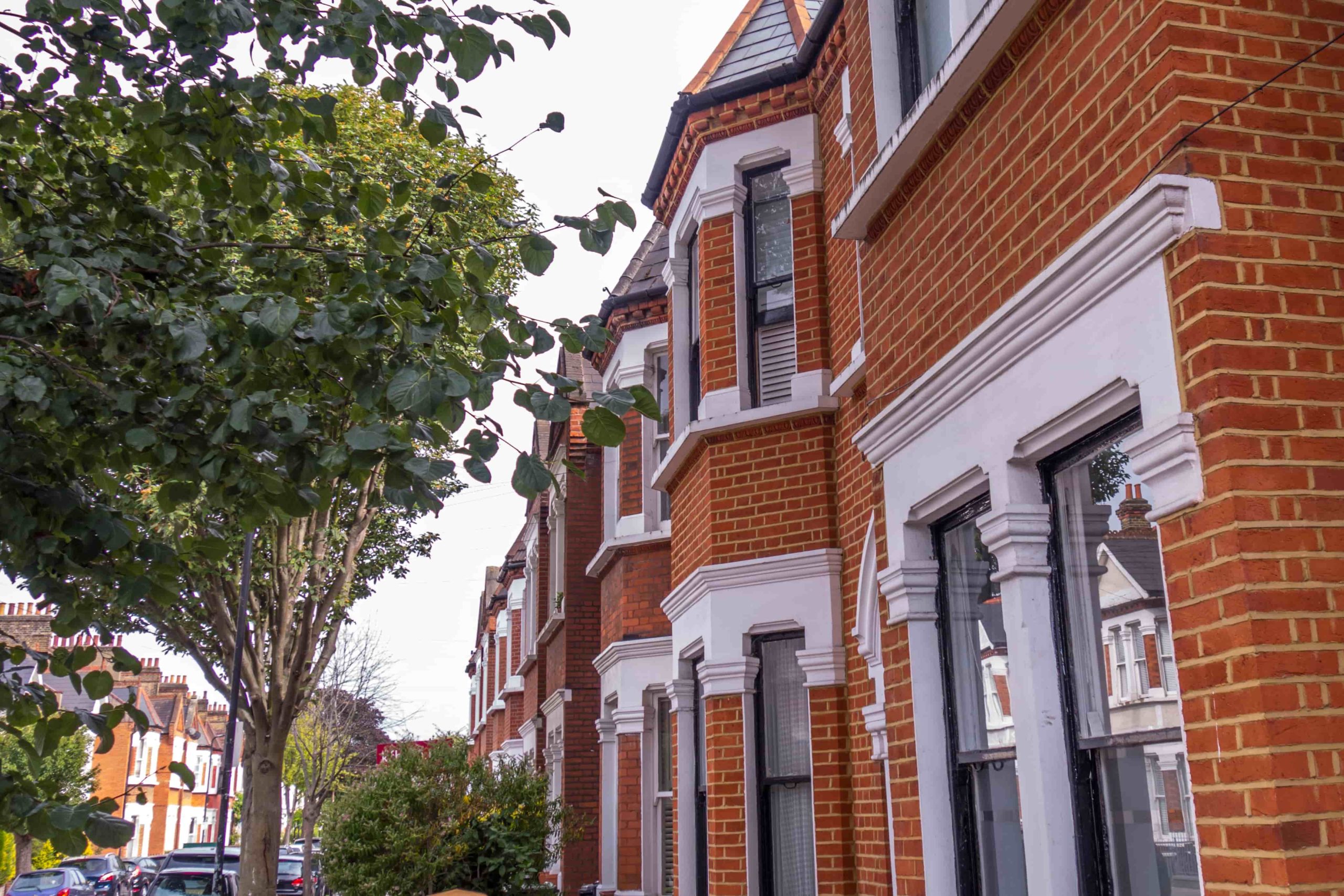 English houses- a typical row of terraced red brick houses in south west London