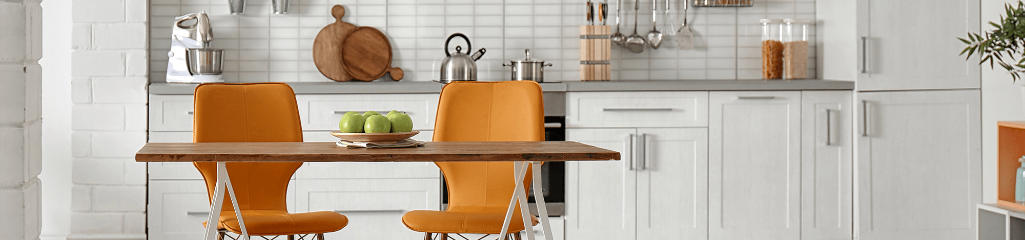 stylish kitchen interior with dining table and chairs