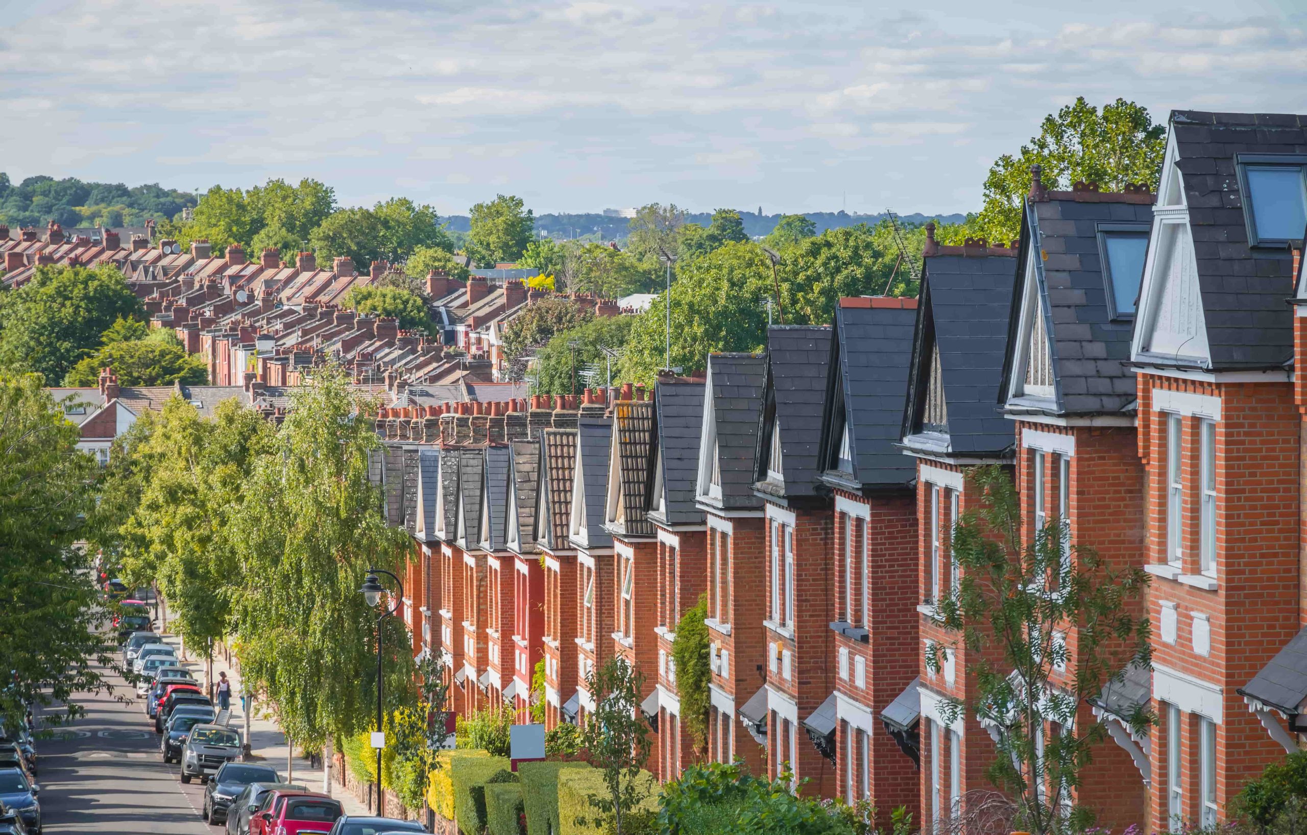 Row of English terraced houses on hilly area in Crouch End, North London