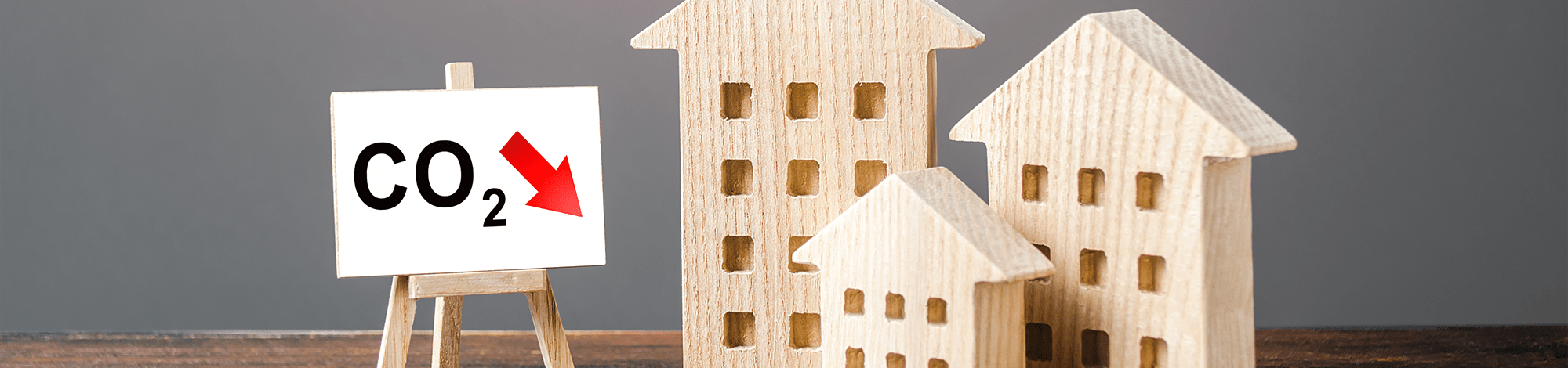 Wooden houses with a sign saying CO2