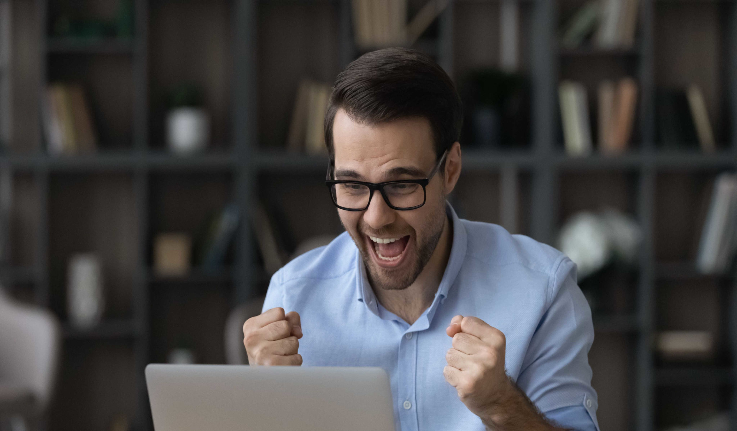 businessman-in-glasses-celebrating-self-employed-mortgage-2