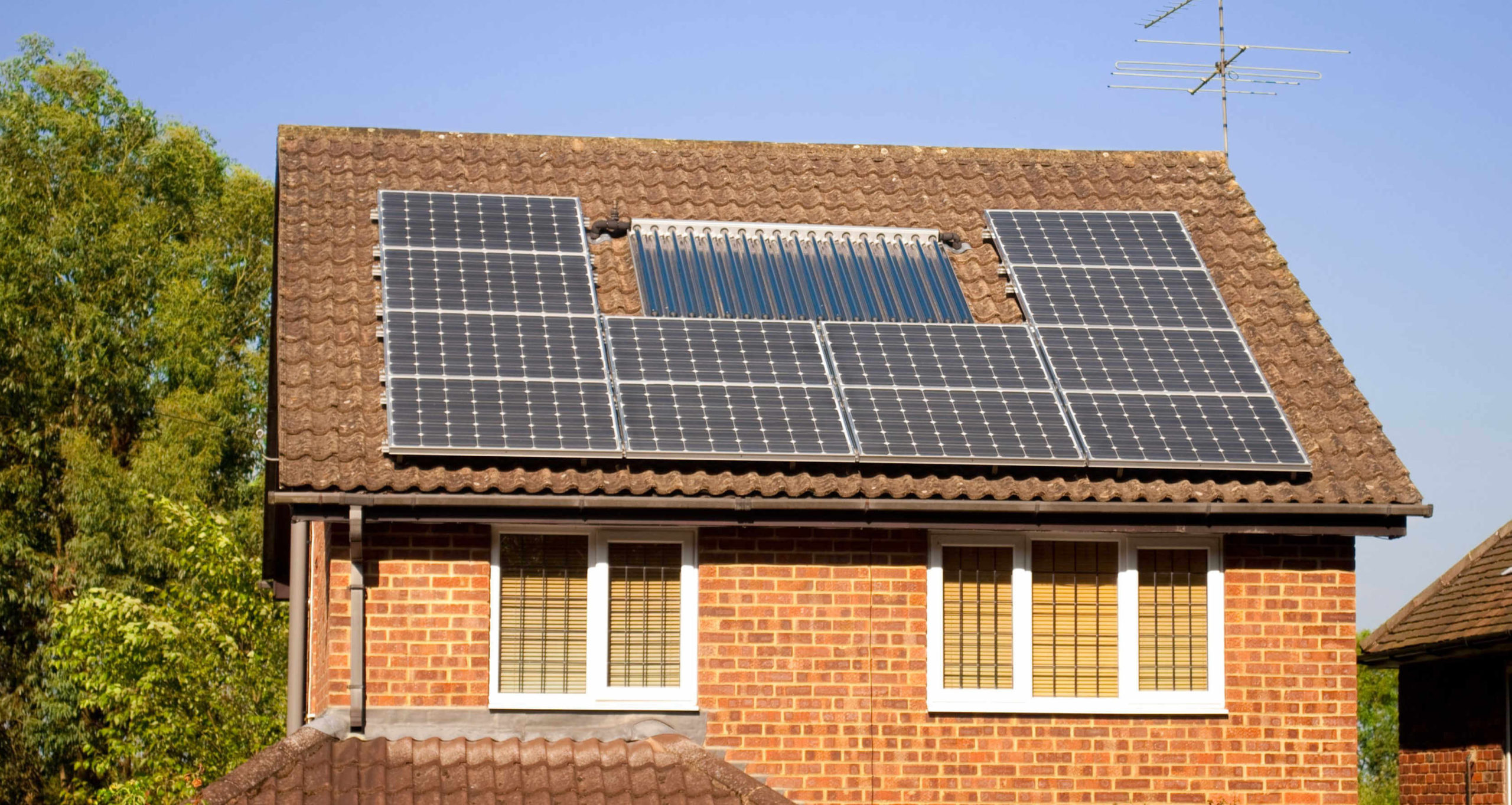 house-with-solar-panels-on-roof