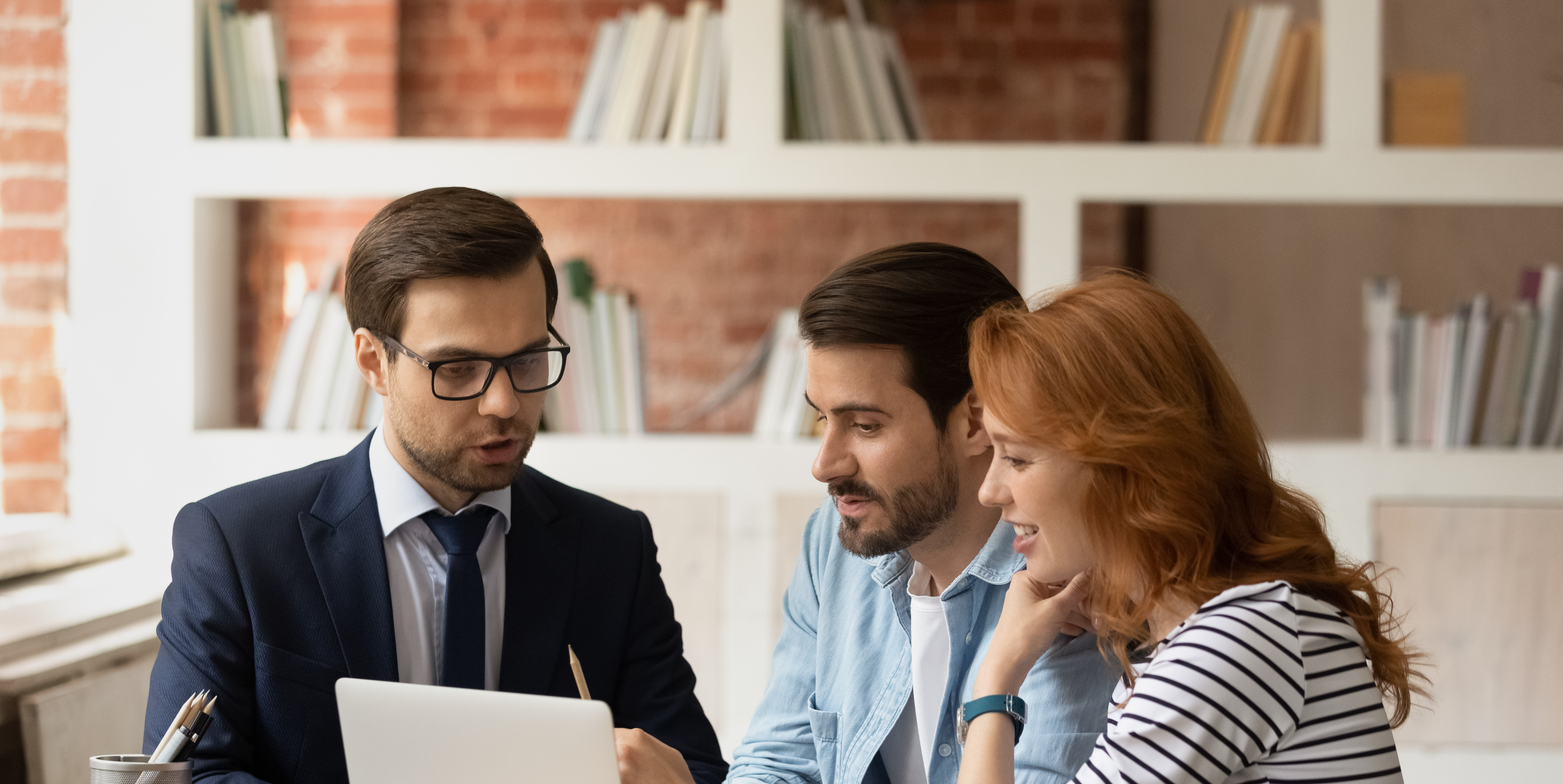 long-term-fixed-rate-mortgages-discussed-with-happy-couple