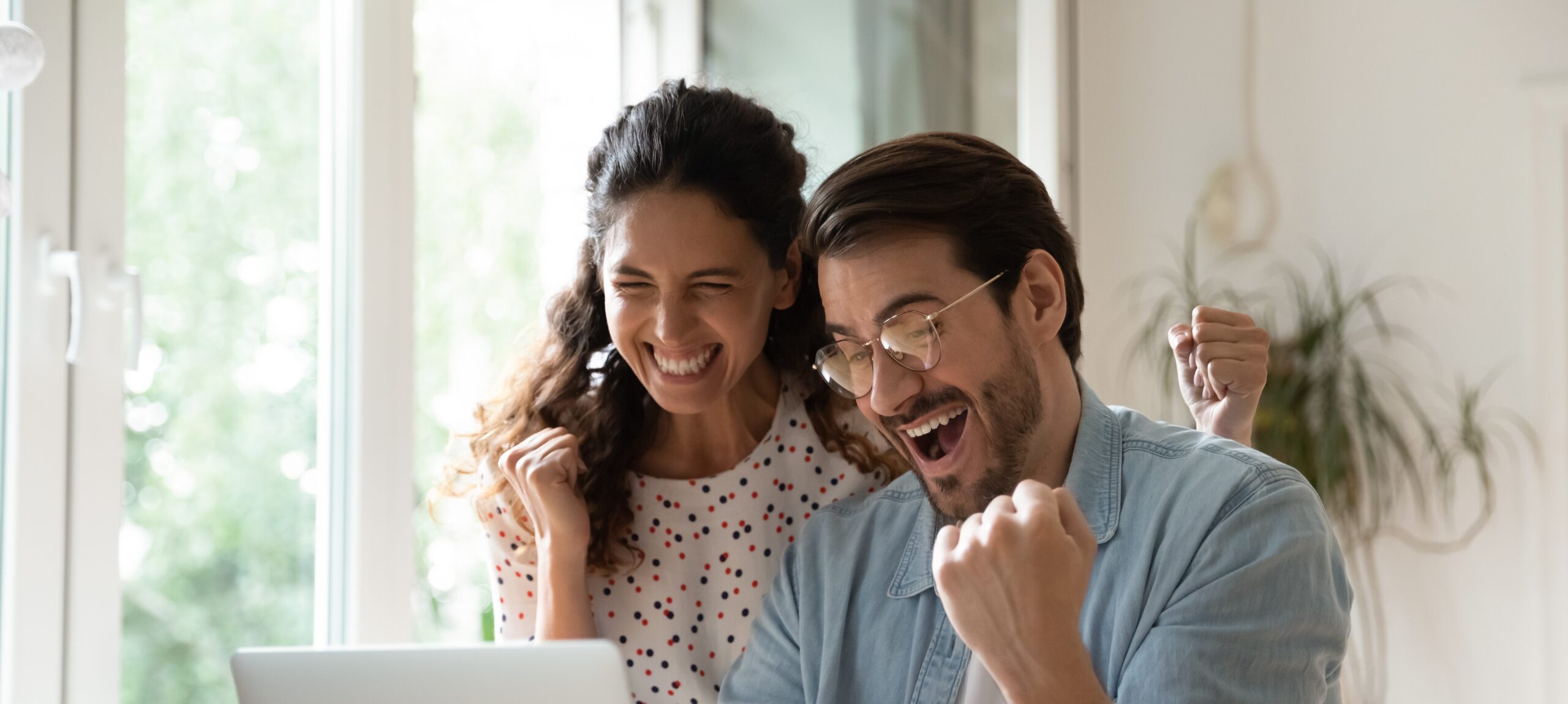 mortgage-charter-approved-overjoyed-couple